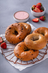 Variety of bagels served with strawberry cream chees and fresh berries