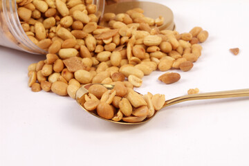 peanuts in a wooden spoon