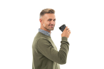 Naklejka premium positive man drinking coffee on background. photo of man drinking coffee.