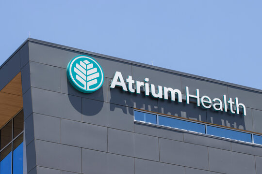 Charlotte, NC, USA - June 18, 2022: Atrium Health logo is seen at the Atrium Health Kenilworth Medical Plaza in Charlotte, North Carolina. Atrium Health is a part of Advocate Aurora Health.