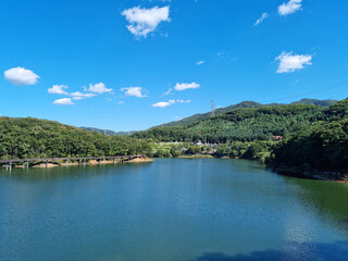 Naklejka na ściany i meble It is a landscape with a wide lake.