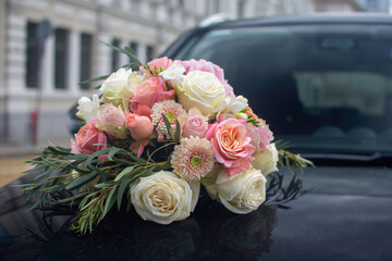 wedding bouquet on the car
