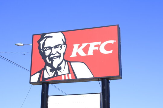 Kentucky Fried Chicken Advertisement  Sign With Blue Sky