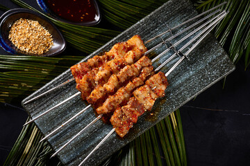 BBQ lamb and beef skewers,,BBQ food, indoor shot, dark tabletop background