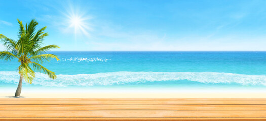 Summer Vacation and Travel Trip Concept : Wooden table with blurred beautiful seascape view and blue sky in background.