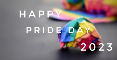 Happy pride day 2023 with blurred rainbow paper ball background, concept for LGBT community...