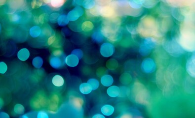 Obraz premium Abstract bokeh pastel background. Bokeh light, shimmering blur spot lights on multicolored abstract background