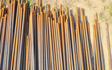 Obraz premium Rebar (short for reinforcing bar), known when massed as reinforcing steel or reinforcement steel, is a steel bar used as a tension device in reinforced concrete and reinforced masonry structures