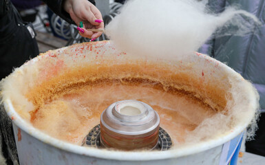 Cooking cotton candy in the park