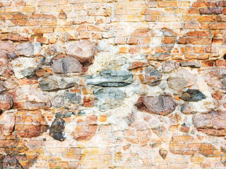 Weathered brick wall texture. Rough background surface.