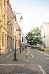 woman walking in the street. person walking in the city