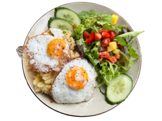 Plate with fried eggs, salad and potato mash isolated on transparency png file