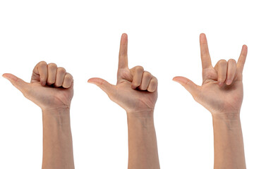 Hand of woman showing thumb-up gesture on white background