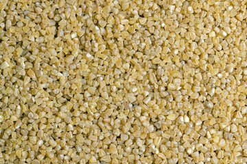 Fresh wheat porridge but cooked scattered on the table