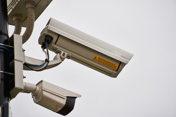 White security camera. CCTV surveillance cam.