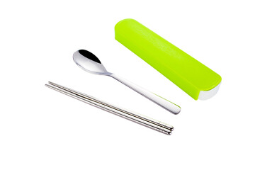 Stainless steel tableware and kitchen utensils placed on the desktop