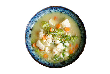 Fresh fish soup with vegetables isolated on transparency png  with copy space