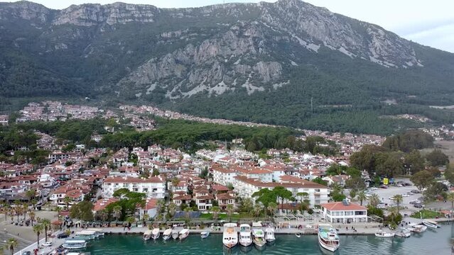 Drone shot of popular town of Akyaka, with its scenic coastline, and stunning natural surroundings, Akyaka is a popular destination for tourists