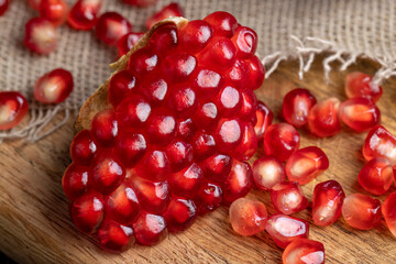 red pomegranate without peel with lots of sweet seeds