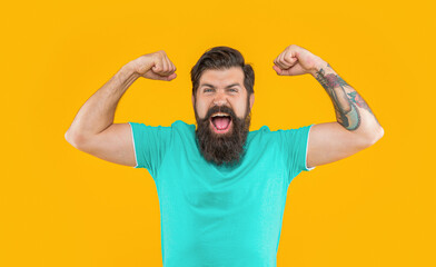 portrait of strong brutal man with beard in studio. portrait of brutal man with beard