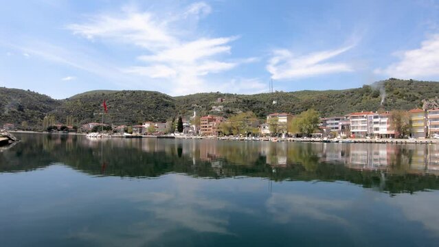 Marmara Island, Turkey - April 2019: Panoramic view of Gundogdu village in Marmara island, which is known for its stunning beaches, crystal clear waters, and historic landmarks