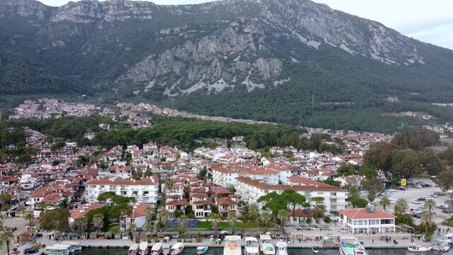 Drone shot of popular town of Akyaka, with its scenic coastline, and stunning natural surroundings, Akyaka is a popular destination for tourists