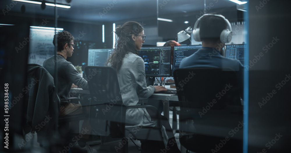 Fototapete Group of Multicultural Men and Women Working in a Research Center, Collaborating and Discussing a Project, Using Computers to Write Advanced Software Code, Develop Artificial Intelligence Service