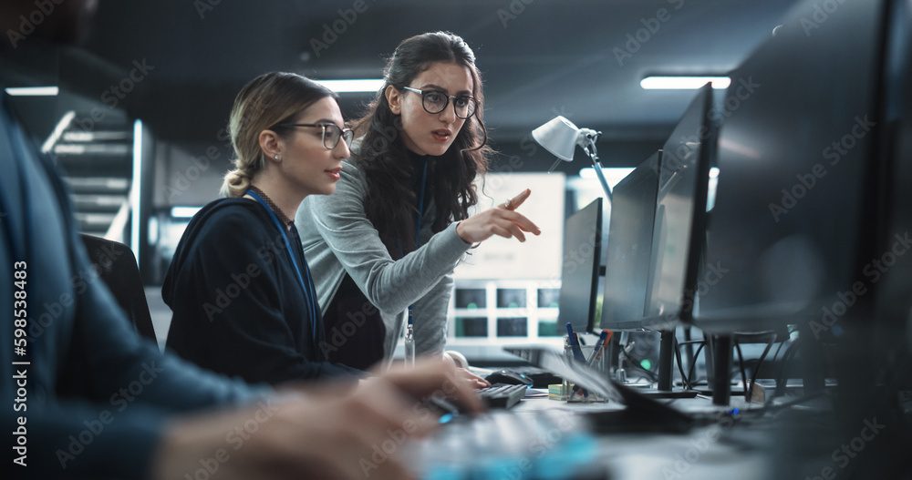 Poster Two Beautiful Women Working in a Cyber Security Software Development Department. Young Manager Updating Software Developer on the Artificial Intelligence Safety Project