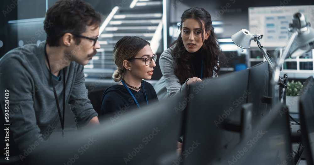 Aufkleber Team of Three Talented Young Software Engineers Use Computer to Discuss a Technological Project in Modern Industrial Office. Group of Male and Female Scientists Work in Research and Development Center