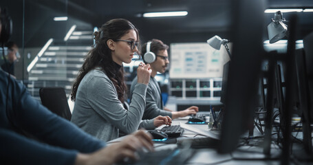 Portrait of a Thoughtful Female Engineer Working on Computer in a Technological Office Environment. Research and Development Department Writing Software Code for an Innovative Internet Project