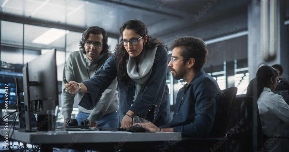 Poster team of three diverse south asian software developers talk, discuss a technological project. empower