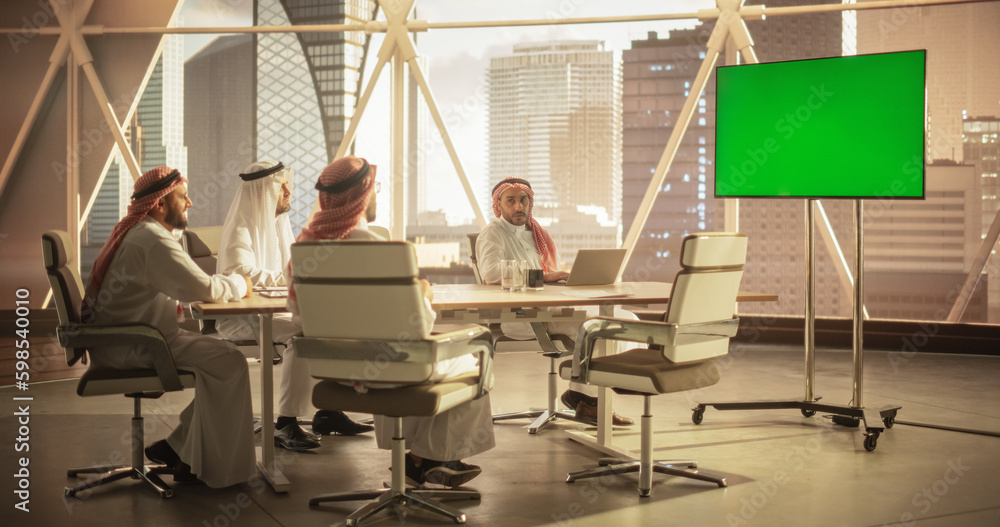 Aufkleber group of middle eastern executives and management having conference video call with a remote interna
