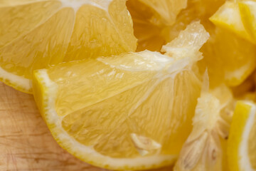 Yellow ripe lemon cut into slices