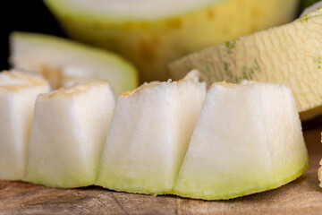 Ripe sweet melon pulp divided into small pieces