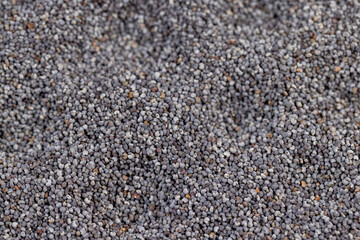 a close-up of a pile of poppy seeds used in cooking