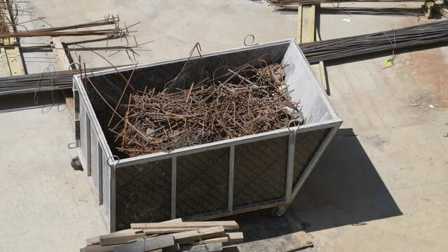 Top view old rusted iron bars o a construction site.