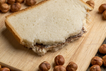 slices of bread with chocolate butter on the table