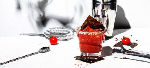 Miso bloody mary alcoholic cocktail drink with tomato juice, japan spices, vodka and nori. White background, hard light, steel bar tools - obrazy, fototapety, plakaty