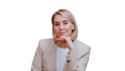 Blonde young businesswoman in beige suit against transparent background looks at camera leaning in hand. Confident caucasian female lawyer ready for meeting. Business people. Psychologist.