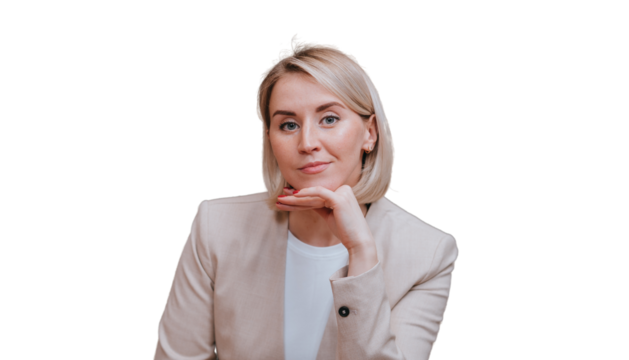 Blonde young businesswoman in beige suit against transparent background looks at camera leaning in hand. Confident caucasian female lawyer ready for meeting. Business people. Psychologist.
