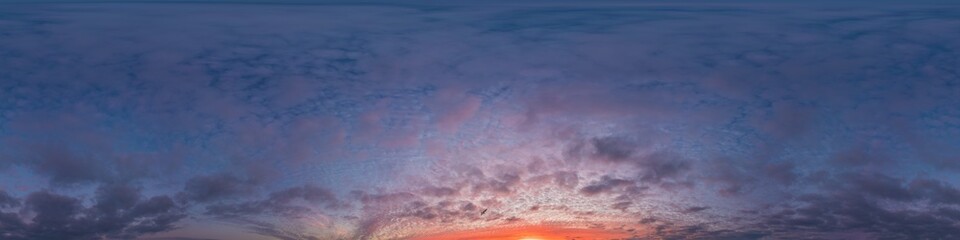 Sunset sky panorama with bright glowing pink Cumulus clouds. HDR 360 seamless spherical panorama. Full zenith or sky dome in 3D, sky replacement for aerial drone panoramas. Climate and weather change.