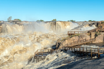 Flooded viewpoint at the main Augrabies waterfall