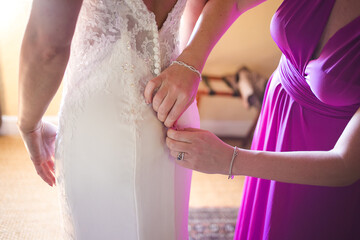 Obraz na płótnie Canvas Creative photo of Bridal Preparation: Putting on Dress, Shoes, and Garter