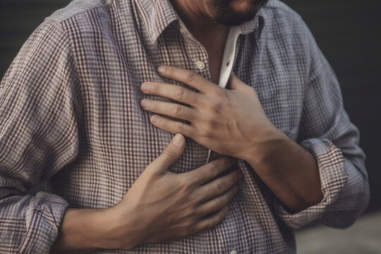 unrecognizable men chest pain  Generative AI