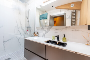 Home bathroom, bright new bathroom interior with tiled glass shower, vanity cabinet, interior designed with dark brown wood