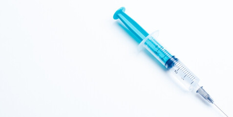 Fototapeta premium Disposable plastic syringe prepared for injection and vaccination in the hospital. The concept of medicine and health