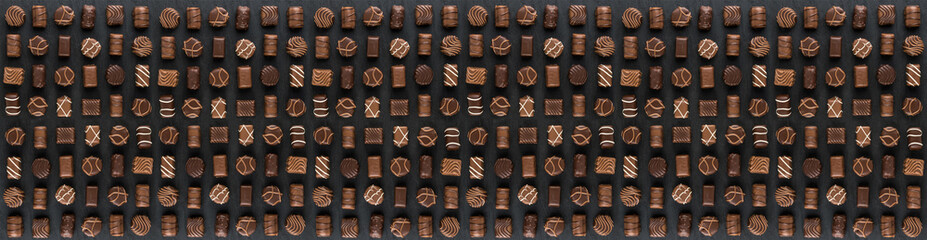 Bonbon Chocolate Pralines Texture Background, Cocoa Candies Banner, Chocolate Praline on Black