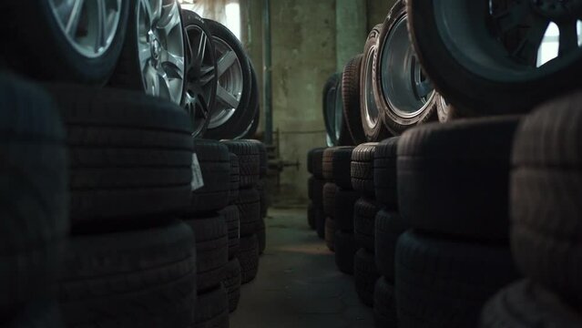 modern warehouse with stack of car tires with metal disk, auto repair service Generative AI