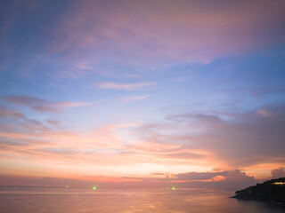 aerial view amazing sky in sunset above the ocean at Karon beach Phuket..Imagine a fantasy bright yellow clouds changing in colorful sky..Gradient color. Sky texture, abstract nature background..