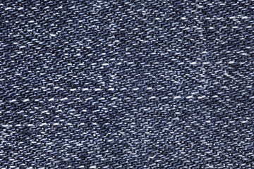 Denim fabric dark, horizontal seams close-up, uniform texture background